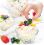 ice cream garnished with fresh fruit in a glass bowl